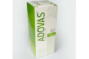 A white and green box of Adovas Herbal Cough Syrup, featuring leaf illustrations and labeled alcohol and sugar-free.
