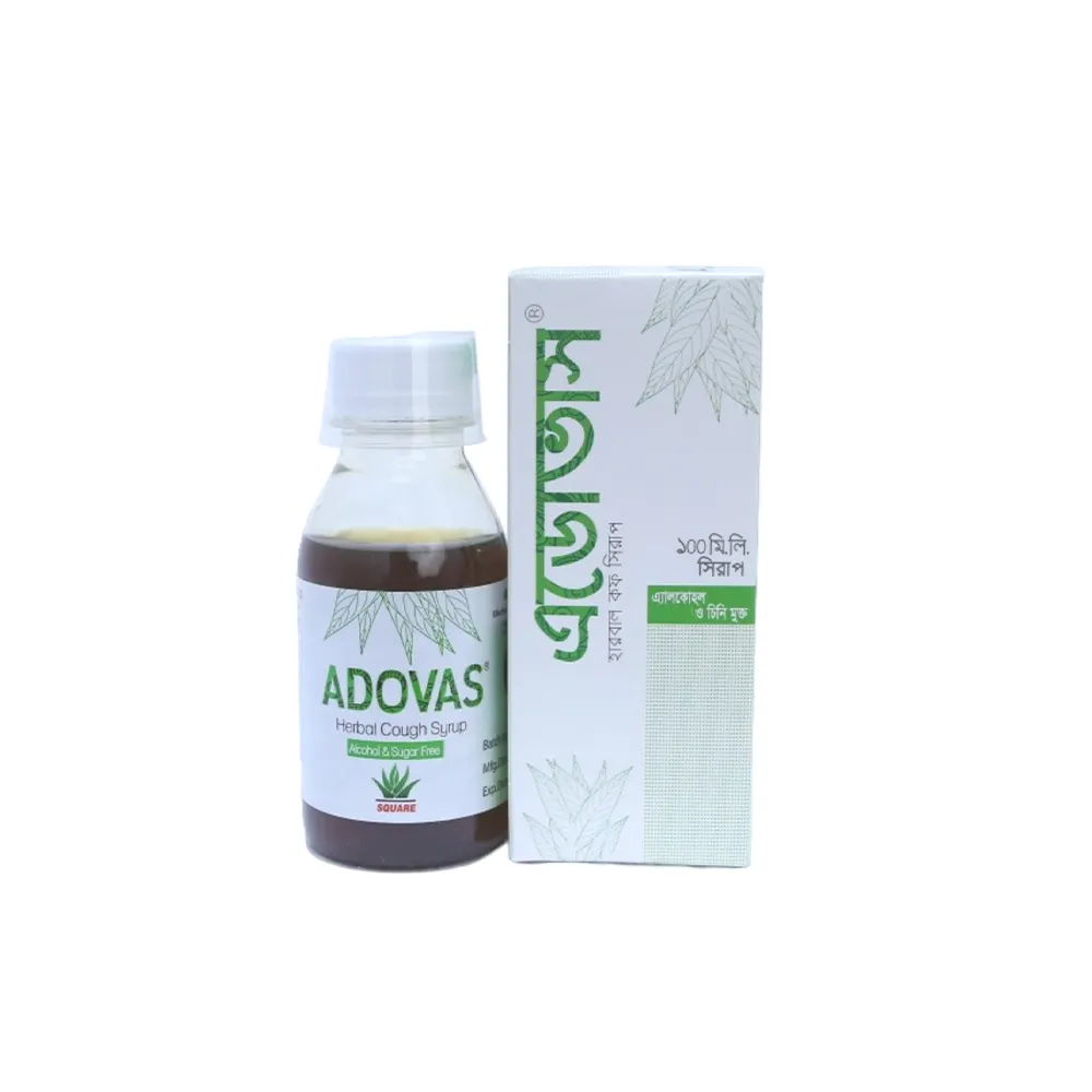 A 100 ml bottle of Adovas Herbal Cough Syrup standing next to its white and green box packaging, featuring "Alcohol & Sugar Free" labeling.