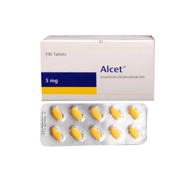 A white and blue box of Alcet 5 mg tablets shown with a silver blister pack containing ten yellow oval tablets.