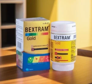 A box and bottle of Bextram Gold comprehensive formula multivitamin and multimineral supplements on a wooden surface.