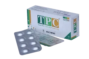 A white and green box of ACME TPC Vitamin B1, B6, and B12 tablets positioned next to a silver blister pack containing eight pills.