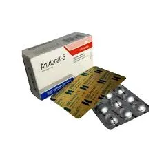 এমডোক্যাল-৫ (Amdocal-5 mg) (অ্যামলোডিপাইন ৫ মিগ্রা) ওষুধের বক্স এবং সাথে রাখা কয়েকটি ওষুধের ব্লিস্টার প্যাক বা পাতার ছবি.