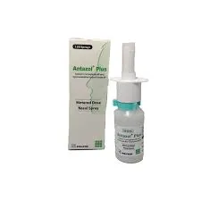 A white box and a transparent bottle of Antazol Plus metered-dose nasal spray featuring a white nozzle.