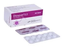 A white box with a purple stripe labeled Disopan 0.5, shown alongside two blister packs of white tablets.