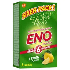 A green box of ENO Lemon Flavor Fruit Salt containing six sachets, featuring illustrations of fresh lemons and effervescent bubbles.