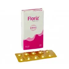 A vertical product box for Floriz Biotin next to a gold-colored blister pack containing individual capsules.
