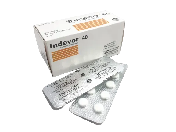 A white and orange box of Indever 40 medication alongside a silver blister pack containing white tablets.