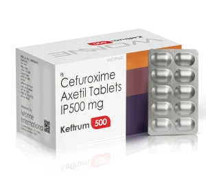 A white and purple box of Keftrum 500 Cefuroxime Axetil tablets sitting next to a silver 10-tablet blister pack.