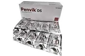 An angled view of a white Penvik DS medicine box positioned behind two rows of silver foil blister packs.