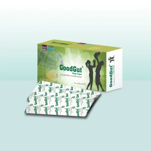 A box and two blister packs of Purnava GoodGut Probiotic Veg Caps against a light blue background, featuring a green design with a family silhouette and digestive system illustration.
