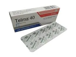 A cardboard box of Telma 40 tablets resting next to an aluminum blister pack of the same medicine.