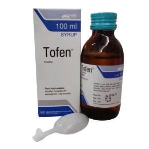 A 100ml bottle and box of Tofen (Ketotifen) syrup by Beximco Pharmaceuticals, shown with a white plastic measuring spoon in the foreground.
