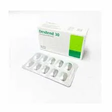 A white and green box of Dexilend 30 medication positioned behind a silver blister pack containing ten medicine capsules.