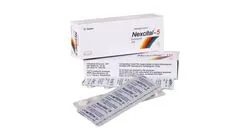 Two white boxes of Nexcital-5 tablets featuring a colorful rainbow-style swoosh design, shown alongside a silver blister pack of pills.