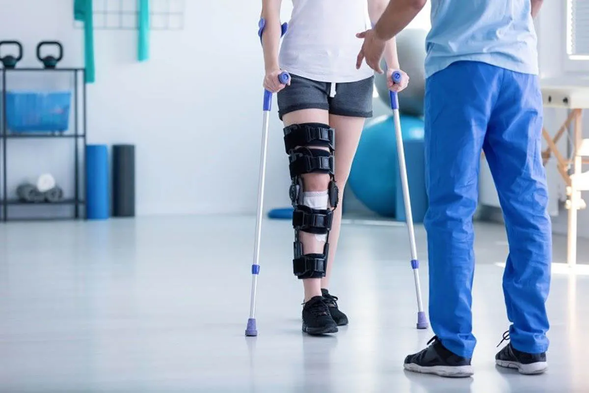 Patient in Physical Therapy for Knee Recovery