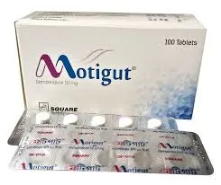 Front view of a Motigut 100-tablet box by Square Pharmaceuticals with a silver blister pack lying in the foreground.