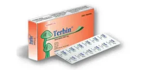 An orange and white box of Terbin 250mg terbinafine tablets with a mushroom graphic, shown next to a silver medicine blister pack.