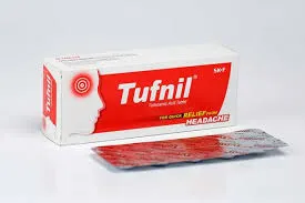 A white and red box of Tufnil (Tolfenamic Acid) tablets sitting behind a silver blister pack, marketed for quick headache relief.