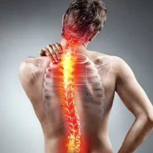 A shirtless man seen from behind with an anatomical overlay of a glowing red and yellow spine, highlighting pain in the neck and upper back.